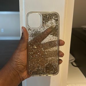A iPhone 11 phone case by guess